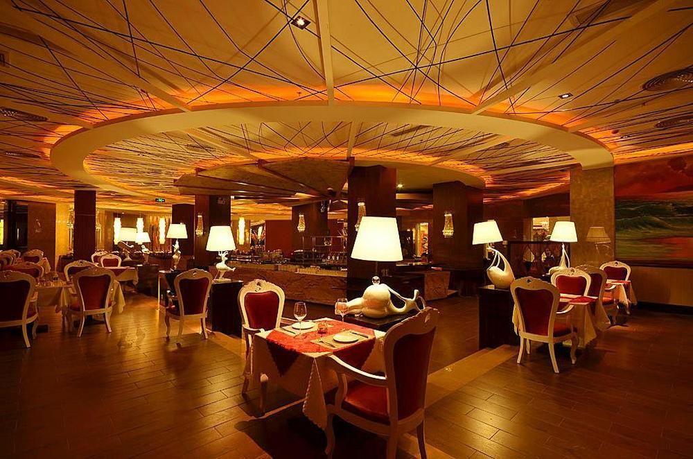 Huangma Holiday Hotel هايكو المطعم الصورة